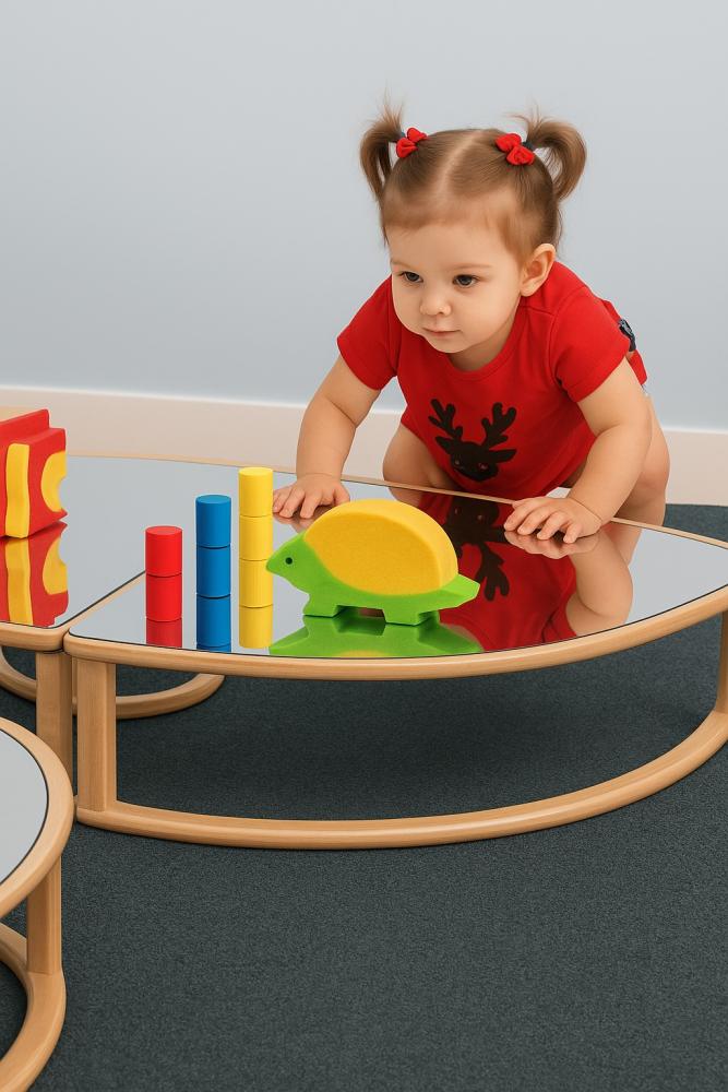 Floor Montessori mirror with wooden frame and a toddler playing