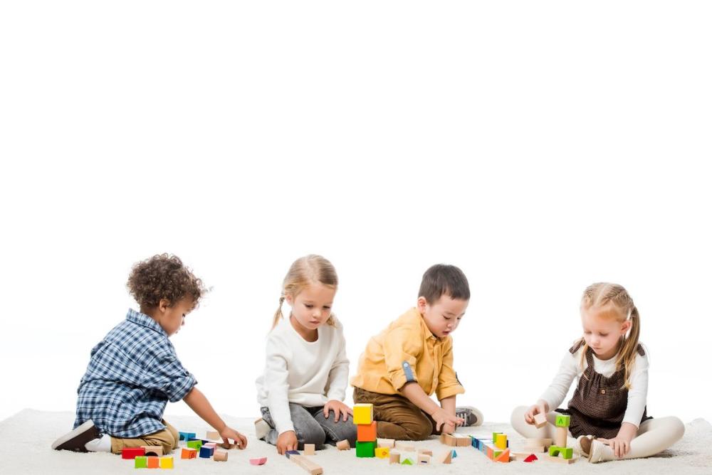 Kids playing with construction blocks