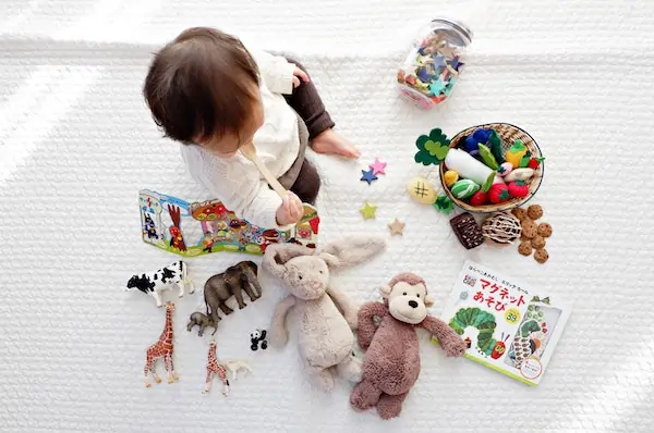 Child Playing with Educational Toys