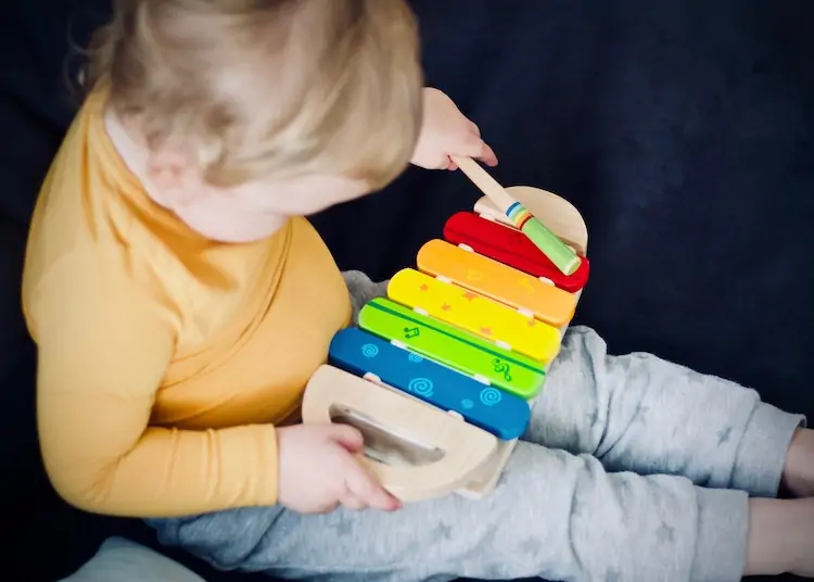 Child Playing with xylophone