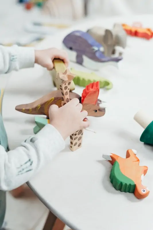 Child playing with Montessori Toys