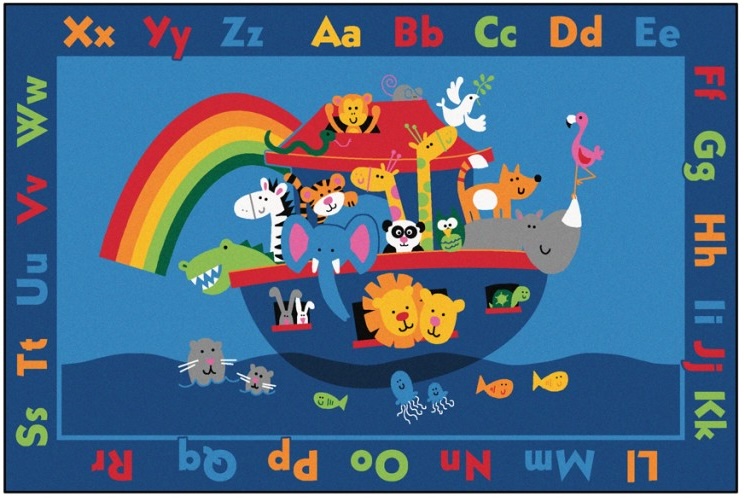 A blue colored rectangular carpet where letters of alphabet are printed in lower/uppercase pairs all around and a whimsical image of Noah's Ark in the middle filled with various animals
