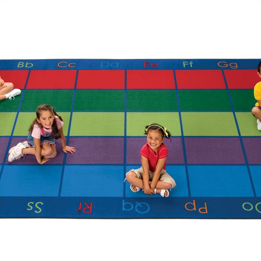 Children enjoying group activities on the Colorful Places Rug