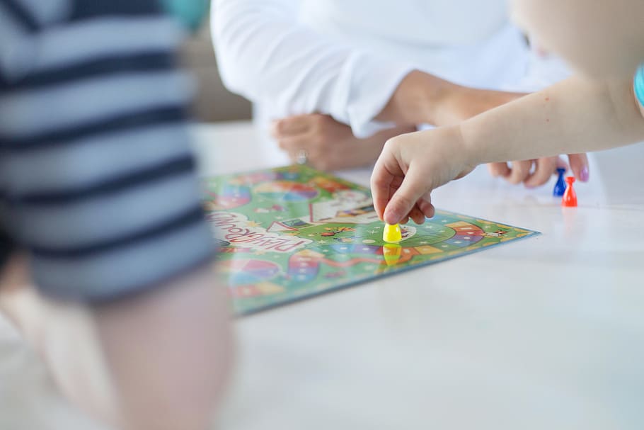 Autistic kids playing board game