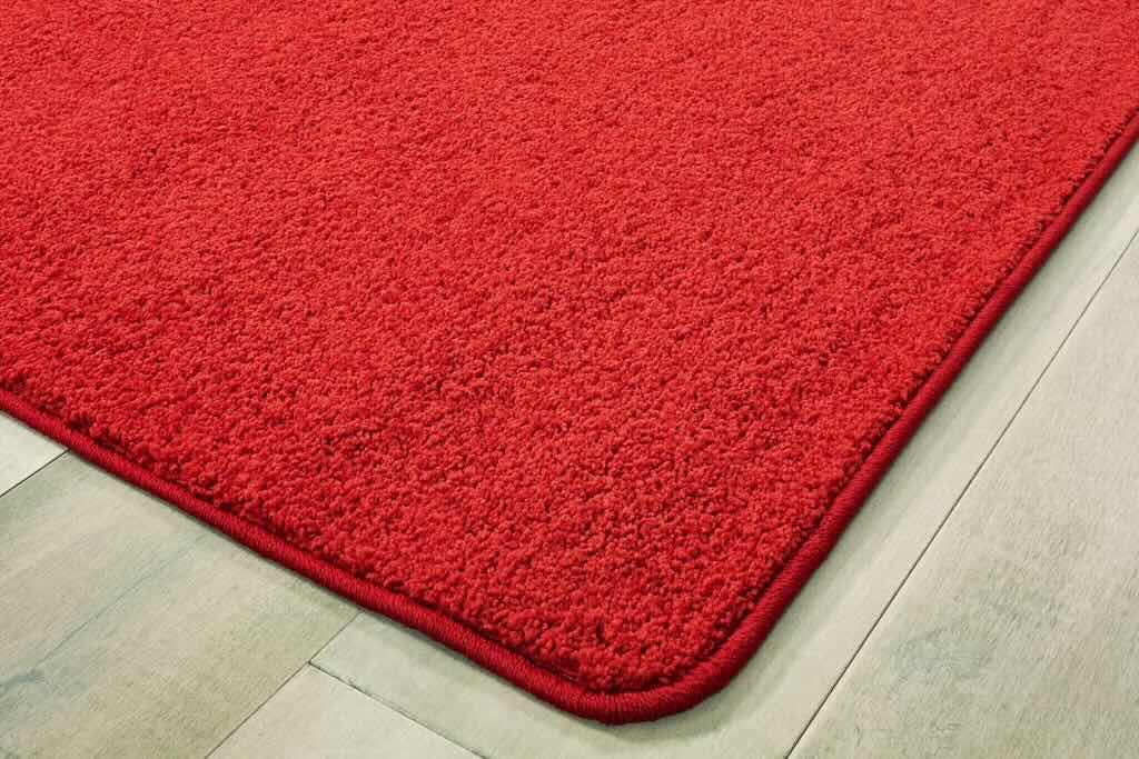 Close-up of Red Velvet Kids Carpet showing Plush Texture